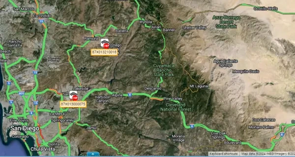 your dashboard live map with two tracked trucks, each labeled with its asset number