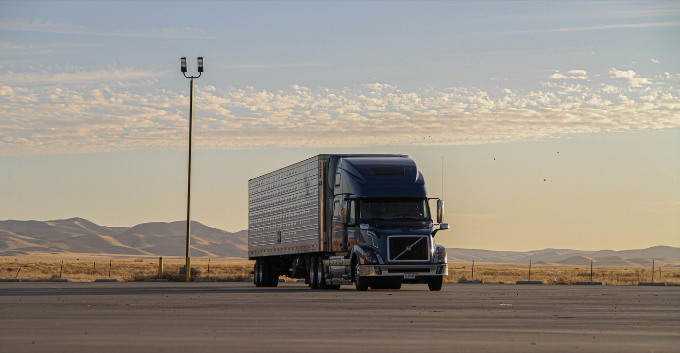 Truck on the road at golden hour